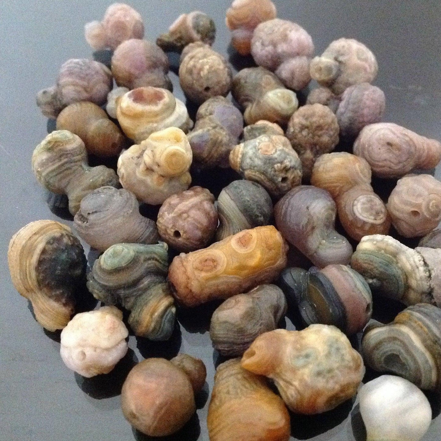 collection of gobi stones on table