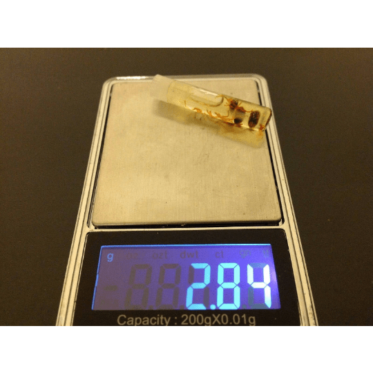 oil container on the weighing scale