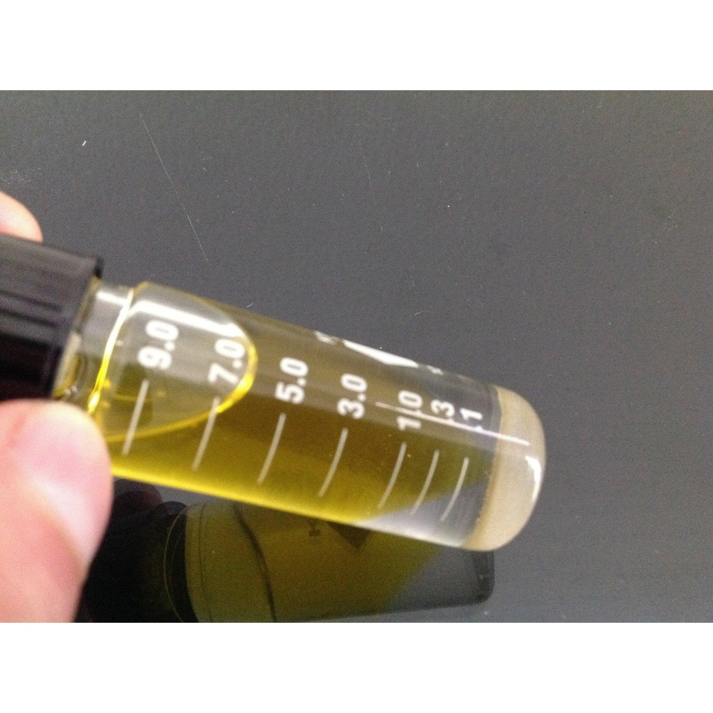 black seed oil quantity shown on container