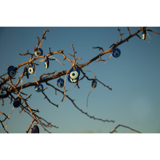 evil eye amulet hanging on the tree